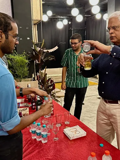 Guests enjoying a drink at a casual get-together, showing the flexibility of our space for different types of events.