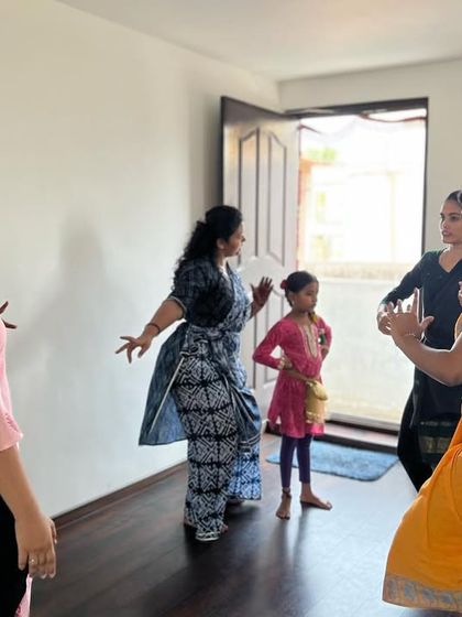 Dancers interacting and learning from each other during a workshop. I encourage a collaborative environment where students can share and grow together.