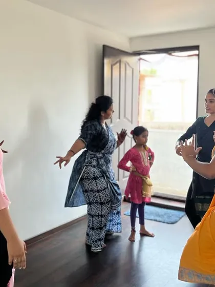 Dancers interacting and learning from each other during a workshop. I encourage a collaborative environment where students can share and grow together.
