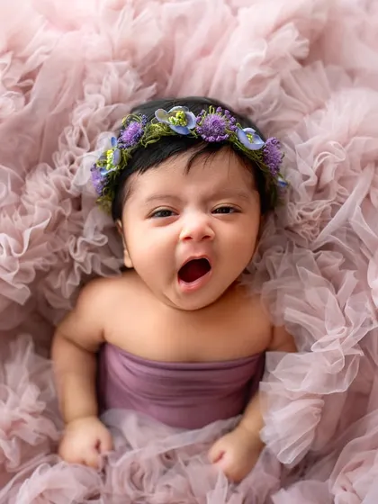That little yawn just gets me every time. Newborn photography is so special because it's about capturing the tiniest details and the sleepy, peaceful moments of their first few days.