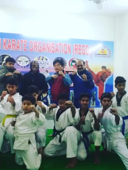 Our team with visiting masters. We believe in learning from different experts to broaden our students' understanding of martial arts.