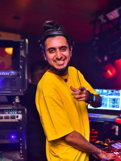 A happy, engaging portrait from behind the decks. This is me in my happy place.