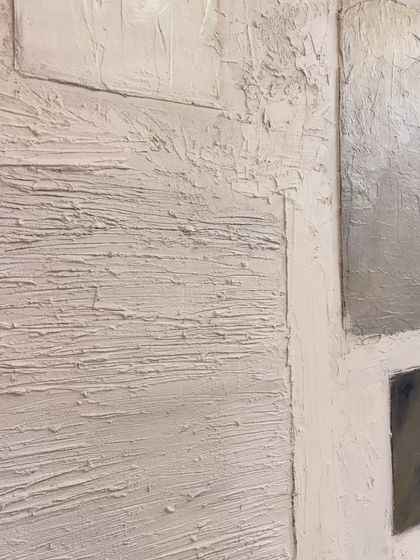 A close-up of the heavy stucco texture on a 4ft x 4ft canvas. This piece, shipped to a client in Houston, U.S., uses different application techniques to create a variety of rough and subtle textures.