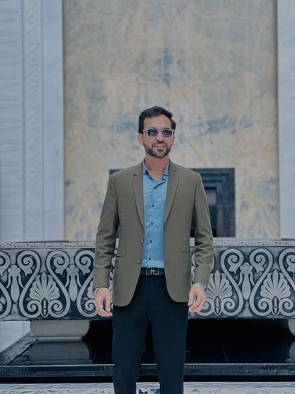 A professional and confident look. Whether it's a formal suit or business casual, I always dress to impress and match the event's dress code.