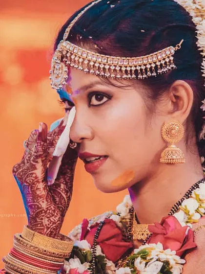 Weddings are full of big emotions, and I believe in capturing them all. This beautiful, candid moment of a bride wiping away a happy tear is a memory to be cherished forever.