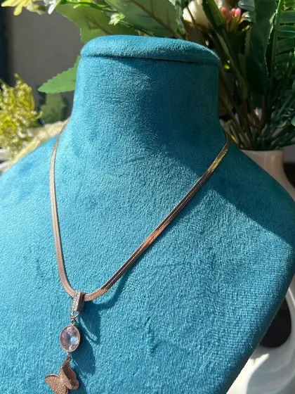 A beautiful butterfly pendant necklace, showcasing the variety of fashion jewellery available.