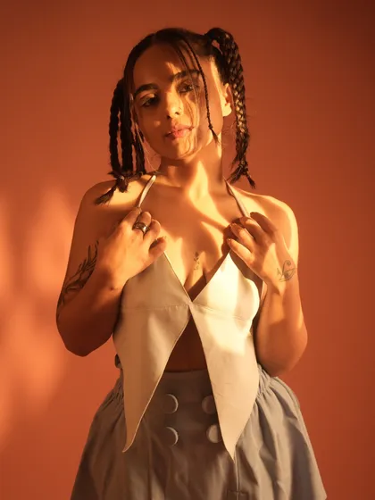 Experimenting with my look and my sound. This photo was taken during a phase where I was exploring different genres. It represents my constant evolution as an artist, always pushing to find new, authentic forms of expression.