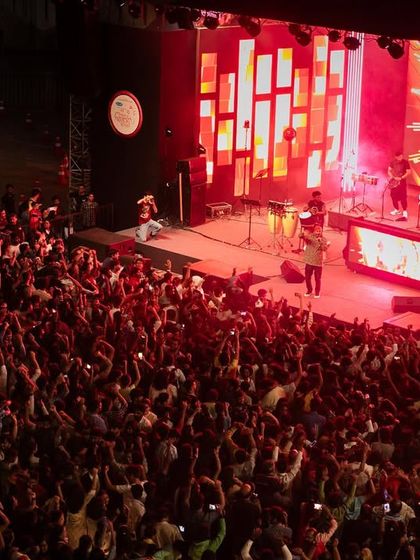 An overhead shot of the festival, showing the scale of the event and the thousands of people in attendance.