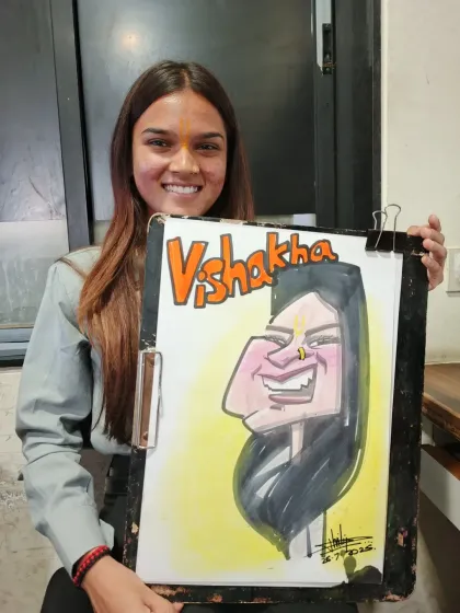 Another shot of Vishakha, this time with a full smile. It's great to see people so pleased with their caricatures.