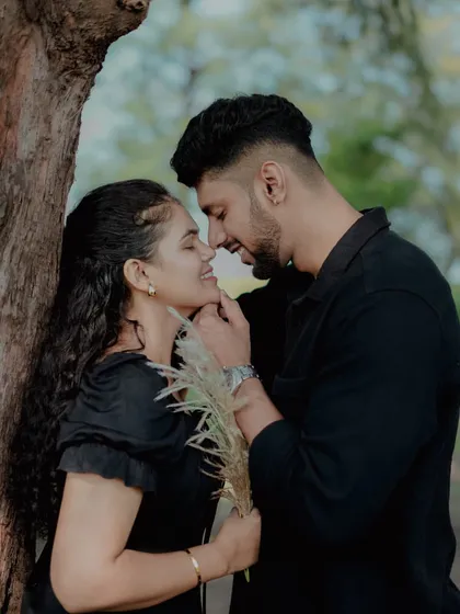 An intimate close-up of a couple during their pre-wedding shoot, highlighting their connection and affection.