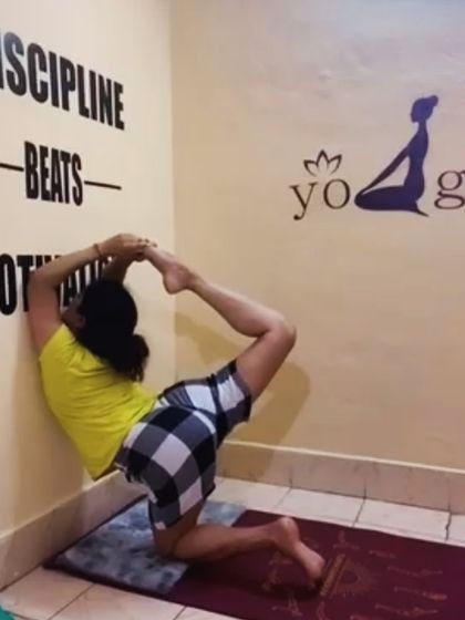 Using the wall to get into a deep one-legged king pigeon pose variation. This is an advanced backbend that requires open hips and a flexible spine.