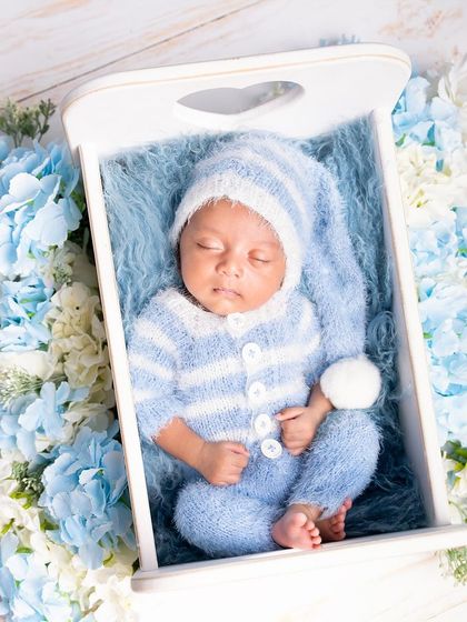 A wider view of this charming blue floral setup, showing how I use props and flowers to create a complete and beautiful scene.