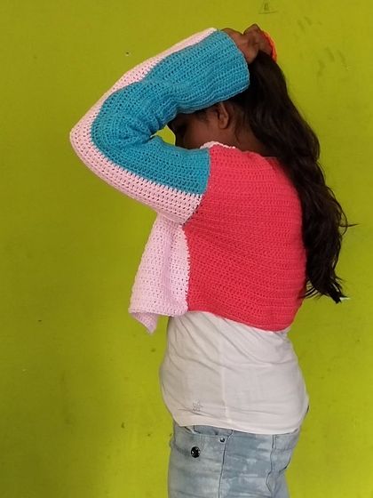 The back view of the cardigan, showcasing the color-blocking.