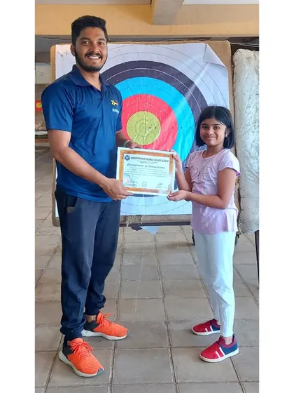 This young girl was a star in our August batch. Here she is, proudly holding her certificate of completion.