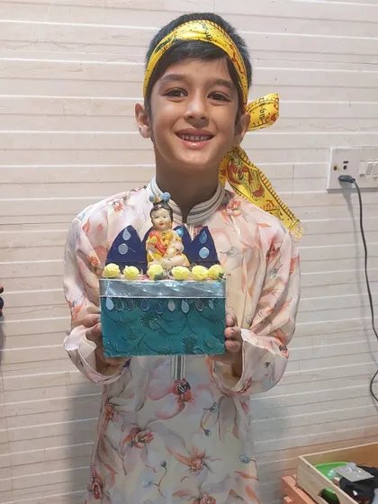 This young artist created a beautiful singhasan for a deity inside his festive box. Our workshops encourage children to connect their art with cultural and spiritual themes.