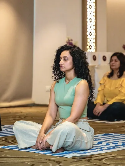 Taking a moment for myself with sound healing and meditation at a wellness event. I believe that managing stress and practicing mindfulness are just as important as a healthy diet.