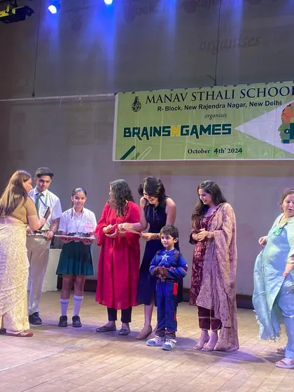 Another moment from the awards ceremony, celebrating the hard work and creativity of the student participants.