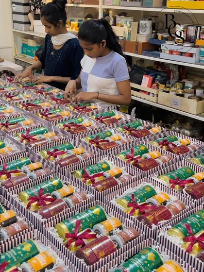 A glimpse into the heart of my studio, where my team is busy assembling a large order. Every hamper is crafted with a keen eye for detail and a passion for creating meaningful connections through the art of gifting.