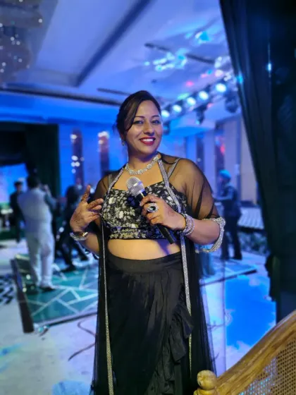 A classic black outfit for a glamorous DJ night. My attire is always chosen to match the power and vibe of the event I am hosting.