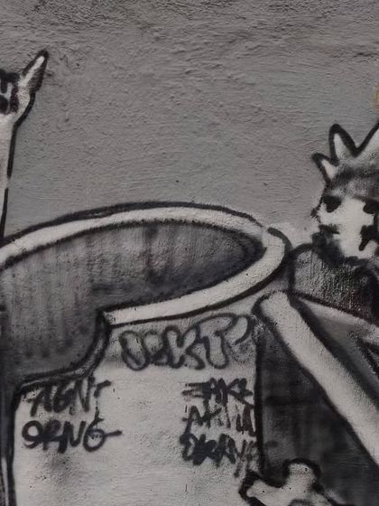 A detail from the mural showing a character throwing up the "rock on" horns. This is a nod to the heavy metal music that inspires much of my gothic and mechanical artwork.