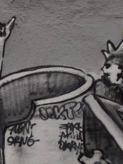 A detail from the mural showing a character throwing up the "rock on" horns. This is a nod to the heavy metal music that inspires much of my gothic and mechanical artwork.