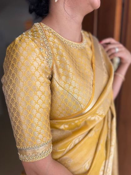 A closer look at my yellow brocade blouse. The princess cut and subtle embroidery make it a very flattering and versatile piece.