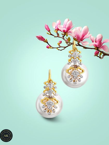 Design meets poetry. These pearl and diamond earrings echo the shape of blooming magnolias, crafted in 18K gold for everyday elegance.