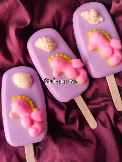 Bringing the ocean to your shower with these seahorse popsicle soaps. The purple base is decorated with a cute pink seahorse and a little seashell, making every wash feel like a mini vacation.