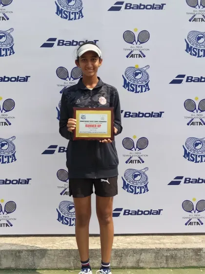 Rumi Gadiya with her runner-up plaque from the All India Championship Series Under 14 Doubles in Mumbai.