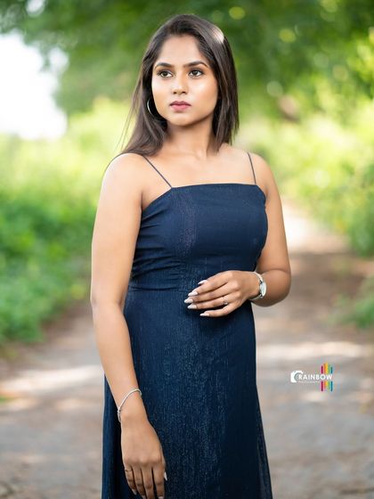 A three-quarter shot that showcases both the outfit and the model's confident stance.