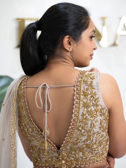 Bloom in elegance with this tulip flower georgette printed lehenga. I paired the floral skirt with a stunning thunder grey raw silk blouse, fully embroidered with gold zardozi for a perfect festive look.