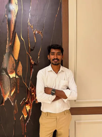 A proud moment standing next to a bold, artistic wall panel in a client's home. This feature adds a unique and personal touch right at the entrance.