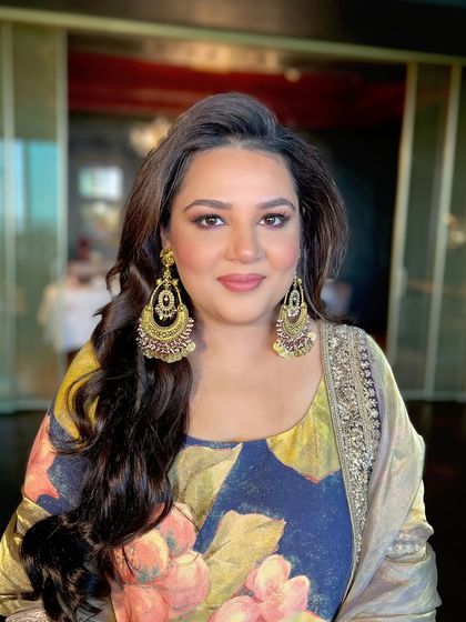 Another close-up, her eyes looking bright and her skin glowing.