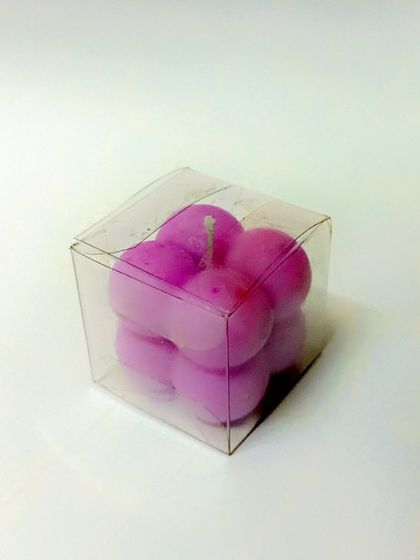A single bubble candle packaged in a clear PVC box. This simple, clean packaging is perfect for showcasing the unique shape and color of the candle.