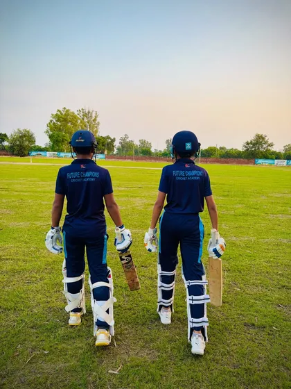Two of our hard-hitters, ready to take on the world. The back of the jersey says "Future Champions" and we believe it.