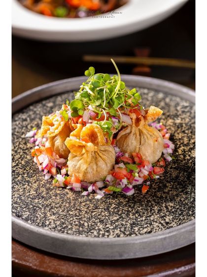 A close-up of the fried money bag dim sum from the Shang Palace appetizer spread.