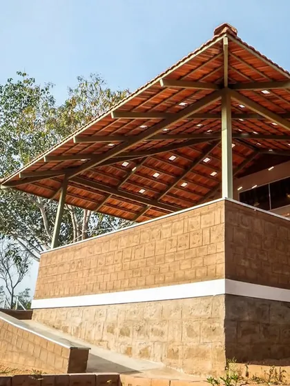 The pattern of the Mangalore tiles on this hipped roof is a classic example of functional and beautiful repetition.