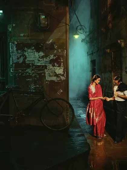 This is a scene from 'Banaras Nocturne', a campaign I styled for Tilfi Banaras. We used the narrow, atmospheric lanes of the city at night to create a moody, cinematic love story, letting the rich texture of the Banarasi saree shine in the low light.