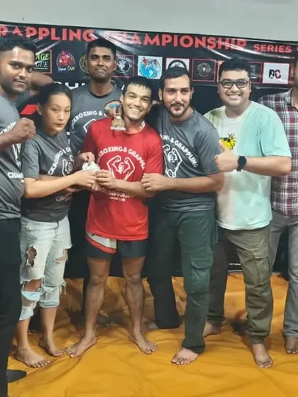 Our top performers from the MFC Series 2 Kickboxing Championship with their coaches.