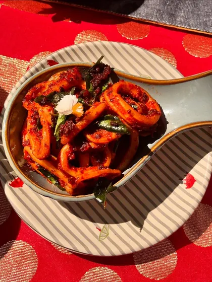 Our Alleppey Squid Roast brings the bold flavours of coastal Kerala to your Christmas table. Fresh squid is slow-cooked in an olarthu style, ensuring every piece is coated in a smoky, spicy, and earthy masala.