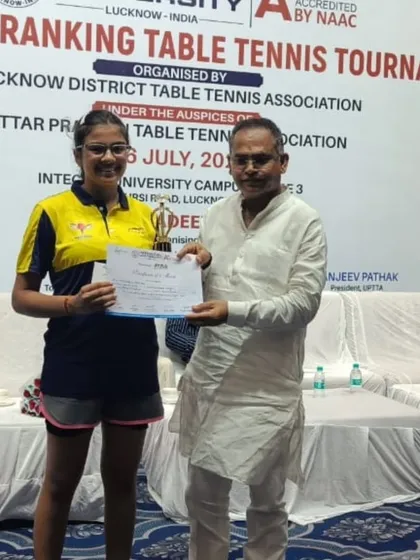 Pehel Gupta receiving her trophy after winning Gold in both the U-13 and U-15 Girls categories in Lucknow.