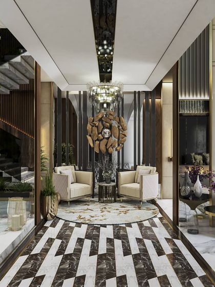 Two perspectives of a luxurious lobby and seating area. The renders highlight the dramatic geometric flooring, a statement chandelier, and the double-height ceiling, conveying a sense of five-star elegance.