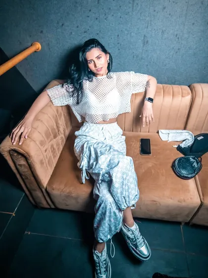 Chilling on the couch before a show. This is my typical pre-set look, comfortable yet stylish.