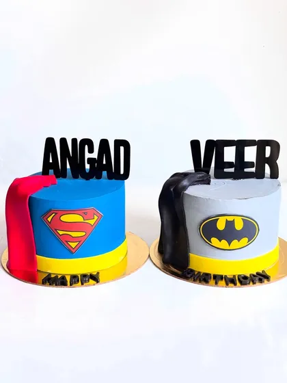 When you have twins who love different superheroes, you make them each their own special cake! Here are the matching Superman and Batman cakes I designed for Angad and Veer.