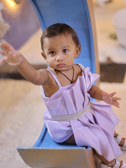 This series shows different angles and poses on our popular crescent moon prop. The set is versatile, allowing for sitting, reaching, and looking-up shots against the starry sky.