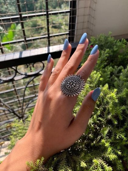 Another shot of the serene blue nails, this time accessorized with a beautiful silver ring.
