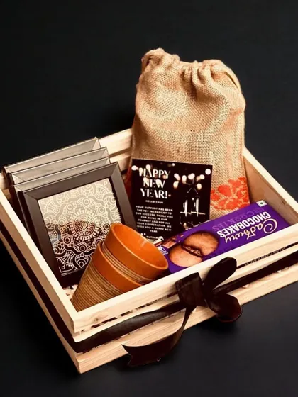 An example of my budget gifting range, this wooden crate hamper includes Cadbury chocolates, terracotta kulhads, and other small treats, with options starting from just Rs. 280.