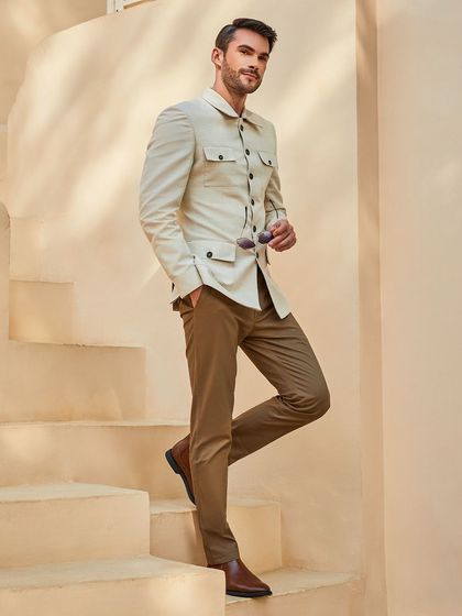 A perfectly tailored shacket that combines European sophistication with a gentleman's suave. This is bespoke menswear at its finest.