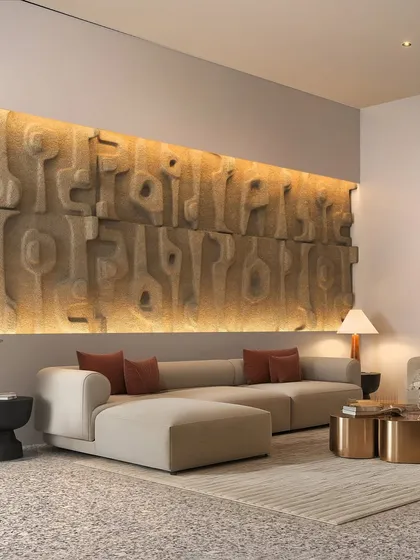 A custom-designed, backlit art wall serves as the focal point in this living space, adding texture and warmth to the minimalist design.