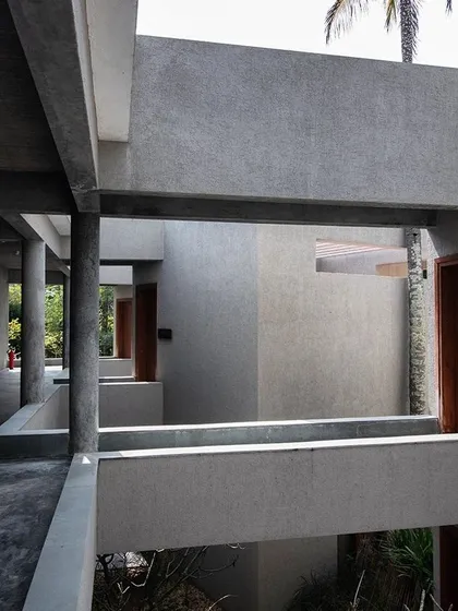 A detail of the intersecting planes and voids at Anahaspa, showcasing the geometric rigor of the concrete structure.